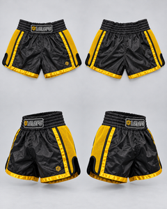 LGLGFG Calibra Muay Thai shorts in black and gold, front and back product views