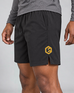 LGLGFG Aegis Shorts in Black worn by model, close up second angle
