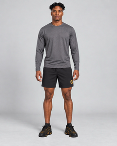 LGLGFG Aegis Shorts in Black worn by model, full length second angle