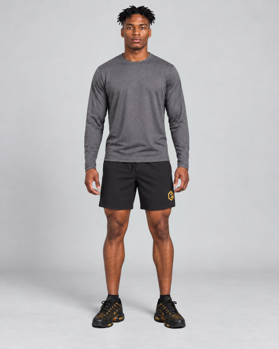 LGLGFG Aegis Shorts in Black worn by model, full length second angle