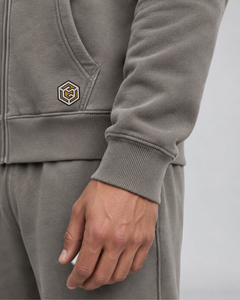 LGLGFG Axis Tracksuit in Faded Grey worn by model, close up second angle