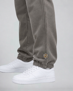 LGLGFG Axis Tracksuit in Faded Grey worn by model, close up third angle
