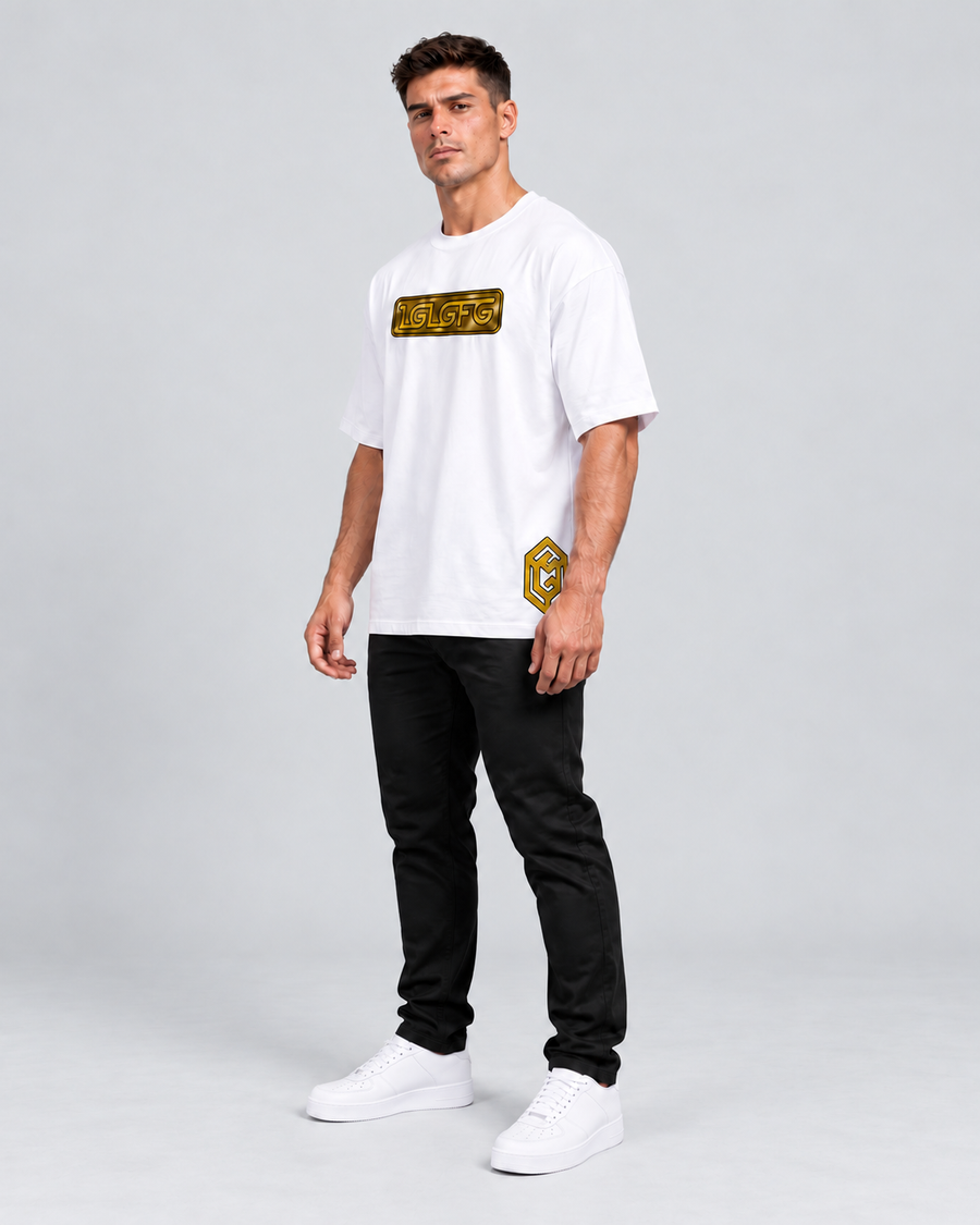 LGLGFG Bullion T in White worn by model, full length. Men's box cut tee