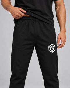 LGLGFG Canon Joggers in Black worn by model, close up second angle
