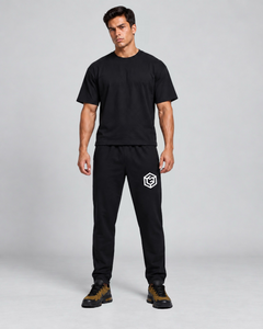 LGLGFG Canon Joggers in Black worn by model, full length third angle
