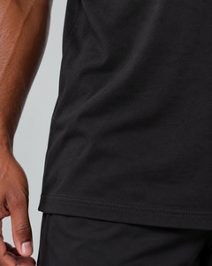 LGLGFG Hybrid T in Black worn by model, close up second angle