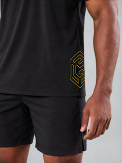 LGLGFG Hybrid T in Black worn by model, close up third angle