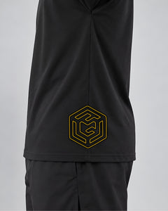 LGLGFG Hybrid T in Black worn by model, close up fourth angle