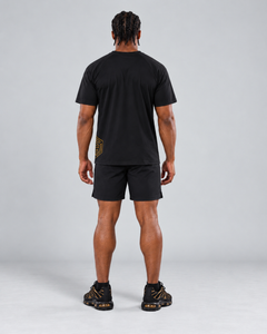 LGLGFG Hybrid T in Black worn by model, full length. Men's ActiveEdge tee