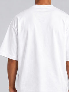 LGLGFG Legacy T in White worn by model, full length. Men's box cut tee