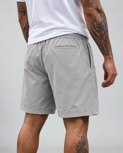 LGLGFG Nexus Board Shorts in Light Grey worn by model, close up on fit