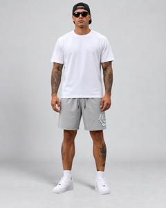 LGLGFG Nexus Board Shorts in Light Grey worn by model, full length second angle